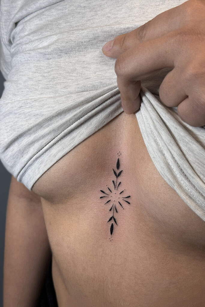 Aesthetic Tattoo Art| Fine line, ornamental sternum tattoo
