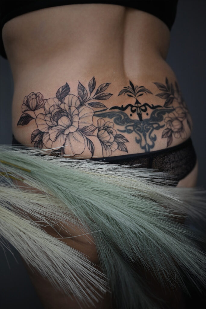 Aesthetic Tattoo Art| Fine line tattoo of peonies and an ornamental piece