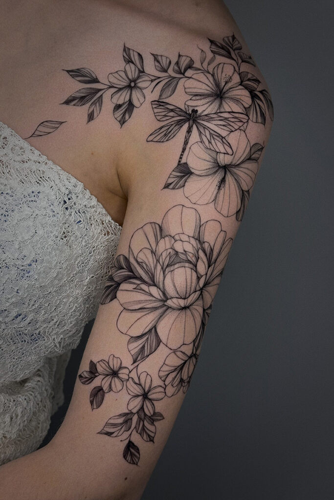Aesthetic Tattoo Art| Fine line tattoo sleeve of peonies with other flowers and a dragonfly