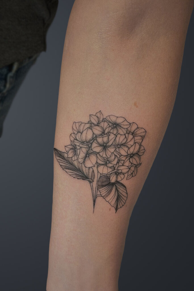 Aesthetic Tattoo Art| Fine line tattoo of a hydrangea