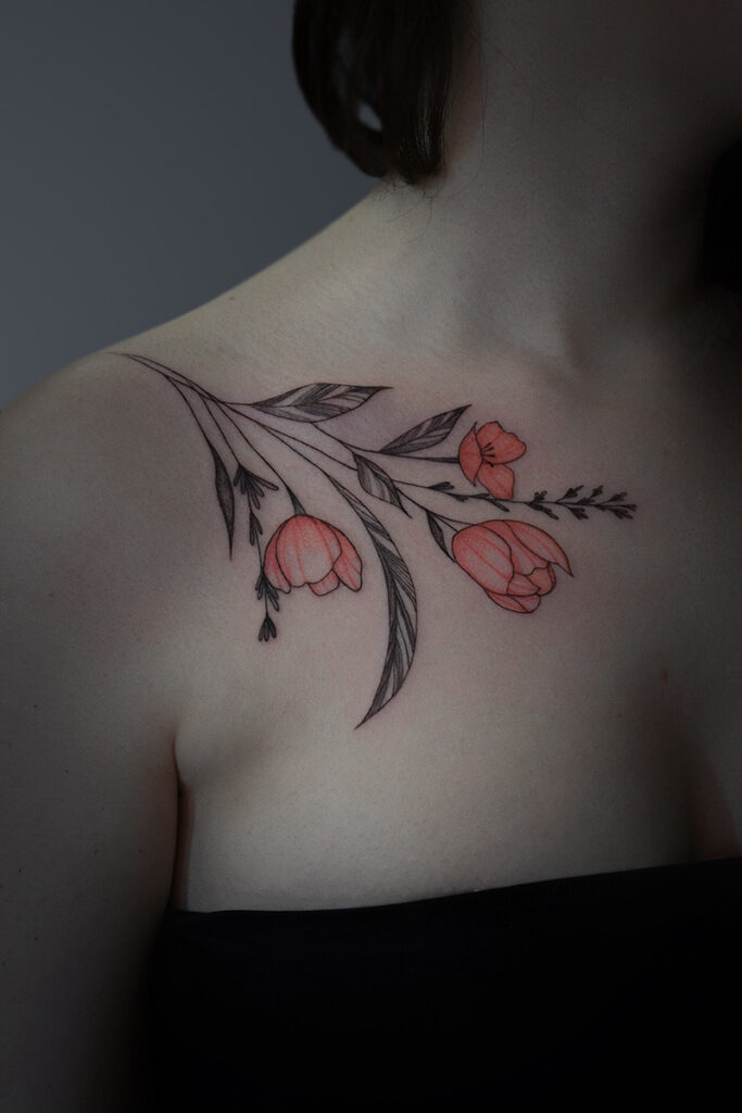 Aesthetic Tattoo Art| Fine line tattoo of a stem of red flowers