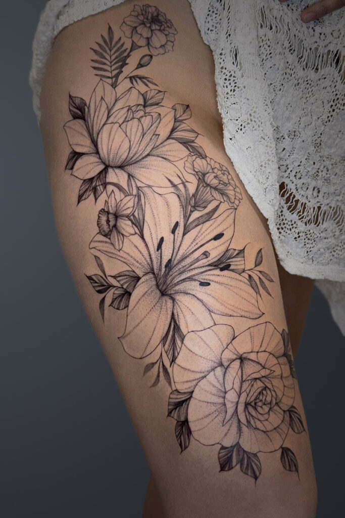 Aesthetic Tattoo Art| Fine line tattoo sleeve of a peony, rose, lily, daffodil and carnations