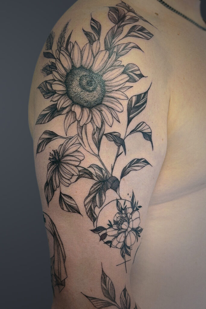 Aesthetic Tattoo Art| Fine line tattoo of a sunflower, wheat and flowers